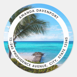 Sticker Rond Belle adresse de palmier tropical balayée par la b