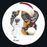 Sticker Rond Bernese Mountain Dog Père Noël Pup Christmas Cadea<br><div class="desc">Le chiot bernois du chien de montagne portant un Casquette du Père Noël est prêt à célébrer Noël. Éclairez votre saison des Fêtes avec cet adorable chiot.</div>