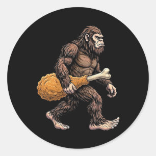 Sticker Rond Bigfoot portant un pilon de poulet amoureux de Sas