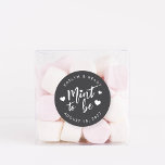 Sticker Rond Black & White Mint to Be Wedding Favor<br><div class="desc">Punny wedding favor stickers feature "mint to be" in white hand lettered script accented with hearts,  on a soft ash black background. Personalize with your names and wedding date.</div>