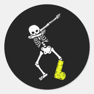 Sticker Rond Blessures amusantes Dabbing Skeleton Broken Leg Ad