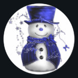 Sticker Rond Blue Christmas Snowman<br><div class="desc">Un bonhomme de neige mignon et lunatique,  vêtu d'un chapeau et d'un gilet en velours bleu,  entouré d'étoiles bleues pour Noël.</div>