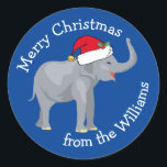 Sticker Rond Blue Elephant Funny Custom Christmas Cadeau<br><div class="desc">Les mignons animaux de vacances sont ma partie préférée de Noël. Un bel éléphant portant un chapeau de Père Noël rouge et qui a l'air heureux. Cet autocollant cadeau d'éléphant bleu personnalisé me remplit d'esprit de Noël.</div>