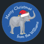 Sticker Rond Blue Elephant Funny Custom Christmas Cadeau<br><div class="desc">Les mignons animaux de vacances sont ma partie préférée de Noël. Un bel éléphant portant un chapeau de Père Noël rouge et qui a l'air heureux. Cet autocollant cadeau d'éléphant bleu personnalisé me remplit d'esprit de Noël.</div>