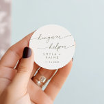 Sticker Rond Boho Chic Green et White Hangover Helper Favoriser<br><div class="desc">Ce boho chic verdoyant et blanc de gueule de bois favorise un autocollant rond classique est parfait pour un mariage minimaliste. Le design bohème moderne et neutre de sauge d'olivier vert et blanc présente une calligraphie rustique simple au style unique mais classique. Personnalisez vos autocollants de faveur avec vos noms...</div>