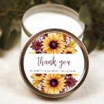 Sticker Rond Boho Sunflower Bourgogne Floral Mariage Merci<br><div class="desc">Cet autocollant mariage rustique présente un design floral d'aquarelle luxuriant composé de tournesols jaunes et de feuillage bordeaux. Les mots "merci" apparaissent dans la calligraphie élégante de l'écriture manuscrite bordeaux. Ajoutez les noms du couple et la date du mariage ci-dessous.</div>