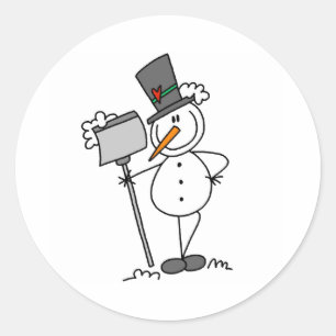 Sticker Rond Bonhomme de neige avec pelle