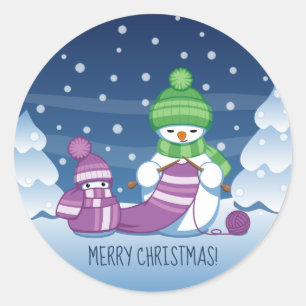 Sticker Rond Bonhomme de neige tricotant une écharpe de Noël