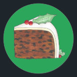 Sticker Rond British Christmas Cake Slice Festive Gastronomie d<br><div class="desc">Le design sur le thème du Royaume-Uni est l'illustration originale d'une délicieuse tranche de gâteau de Noël britannique,  surmontée de feuilles saints et de baies. Idéal pour fêter la période festive !</div>