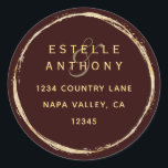 Sticker Rond Burgundy Rustic Gold Ampersand Return Address<br><div class="desc">This return address sticker features a faux gold circle frame with an elegant ampersand and simple calligraphy with a burgundy marsala background.</div>
