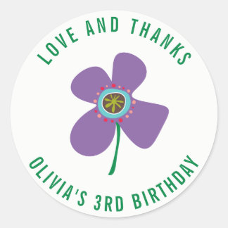 Sticker Rond Cadeau de fête de fille avec une marguerite violet