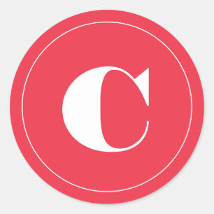 Sticker Rond cadeau de vacances initial rose vif