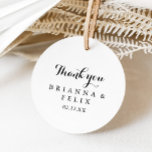 Sticker Rond Calligraphie moderne Merci Mariage Faveur<br><div class="desc">Cette calligraphie moderne merci mariage faveur classique collant rond est parfait pour un mariage rustique. Le design sobre et élégant présente une typographie de script classique et sophistiquée en noir et blanc. Faites de l'autocollant votre propre étiquette en incluant vos noms, l'événement (s'il y a lieu) et la date. Ces...</div>