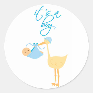 Sticker Rond C'est une cigogne bleu garçon tenant des auto-coll
