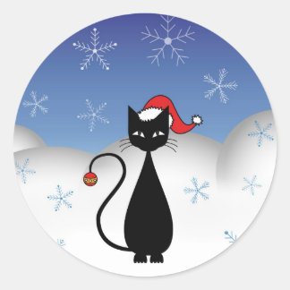 Sticker Rond Chat de Noël avec des flocons de neige