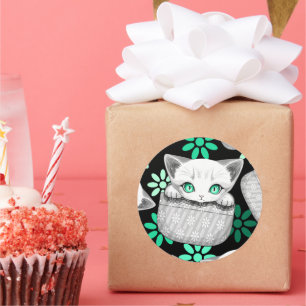 Sticker Rond Chat mignon et joueur sortant d'une poche