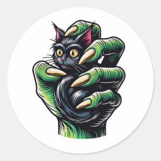 Sticker Rond Chat noir attrapé par la main de la cuisine