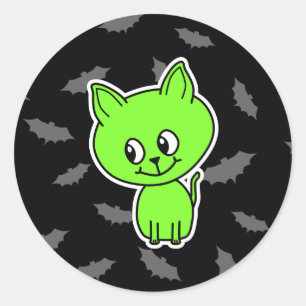 Sticker Rond Chat vert éffrayant mignon avec des battes