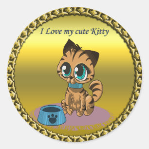 Sticker Rond Chaton mignon et peluche or jouant avec les yeux d
