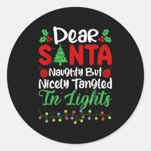 Sticker Rond Cher Père Noël méchant mais joliment empêtré dans