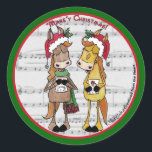 Sticker Rond Chevaux de covoiturage - 'Mare'y Christmas<br><div class="desc">Ces Chevaux de Noël Caroler sont là pour vous souhaiter un Noël Mare'y ! Amusant jouer sur les mots image avec chanter des chevaux contre arrière - plan de partitions. Design original par Christie Black de Creations from the Heart.</div>
