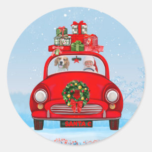 Sticker Rond Chien Beagle dans une voiture avec le Père Noël 