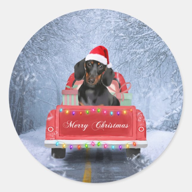Sticker Rond Chien de Dachshund en neige assis sur un camion de (Devant)