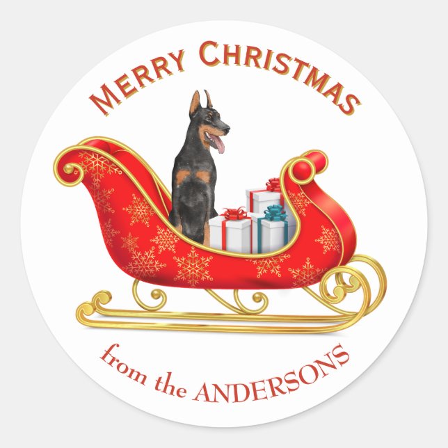 Sticker Rond Chien Doberman Pinscher au traîneau de Noël (Devant)