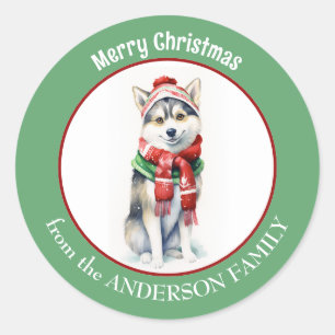 Sticker Rond Chien sibérien Husky dans l'écharpe de Noël rouge