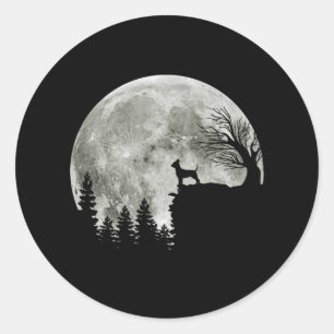 Sticker Rond chihuahua sur la grande lune de montagne halloween