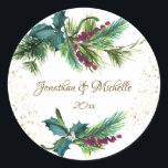 Sticker Rond Christmas Evergreen Red Berry Winter Wedding<br><div class="desc">Elegant Christmas Wedding sticker depicts simple watercolor evergreen branches adorned with holly leaves,  red berries and gold splashes. Good choice for winter and Christmas weddings.*</div>