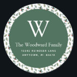 Sticker Rond Christmas Greenery Adresse du Motif<br><div class="desc">Cet autocollant festif d'adresse de retour de Noël comporte un cercle vert sur un motif de verdure hivernale, y compris des feuilles saints, des baies rouges et des sprigs de mistletoe, sur un arrière - plan blanc. Personnalisez le design avec votre nom de famille et votre initiale monogramme en police...</div>