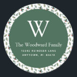 Sticker Rond Christmas Greenery Adresse du Motif<br><div class="desc">Cet autocollant festif d'adresse de retour de Noël comporte un cercle vert sur un motif de verdure hivernale, y compris des feuilles saints, des baies rouges et des sprigs de mistletoe, sur un arrière - plan blanc. Personnalisez le design avec votre nom de famille et votre initiale monogramme en police...</div>