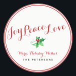 Sticker Rond Christmas Holly Joy Peace Love Script Custom<br><div class="desc">Célébrez la saison avec cette belle étiquette d'adresse de retour de vacances qui contient les mots JOY PEACE LOVE dans une élégante police de caractères rouge et une épée de saint aquarellé festif ci-dessous. Personnalisez en ajoutant votre propre salutation et votre nom. Beau et classique mais simple et tendance, un...</div>