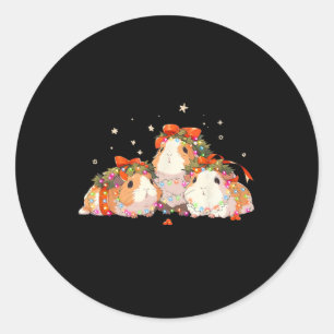 Sticker Rond Cochons d'Inde emmêlés dans les lumières de Noël G