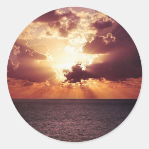 Sticker Rond Coucher de soleil nuageux sur la mer