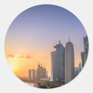 Sticker Rond Coucher du soleil au-dessus de la ville de Doha,