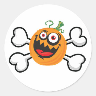Sticker Rond Crâne Citrouille fou et os croisés