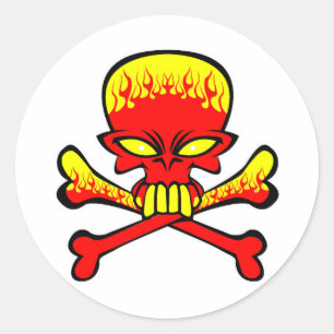 Sticker Rond Crâne flamboyant et os croisés