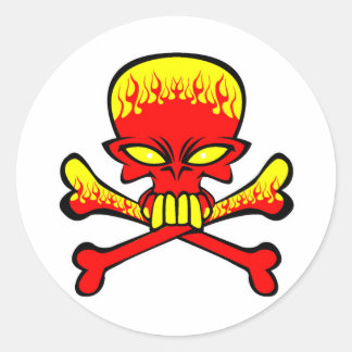 Sticker Rond Crâne flamboyant et os croisés
