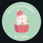 Sticker Rond Cute Cupcake Snowman, Sweet Christmas<br><div class="desc">Un autocollant de décoration de Noël mignon avec l'illustration d'un bonhomme de neige au cupcake avec chapeau de Père Noël dégivrant,  bras de biscuits et garnitures d'arrosage ! Parfait pour souhaiter un doux Noël à vos amis ! Personnalisez avec un message.</div>