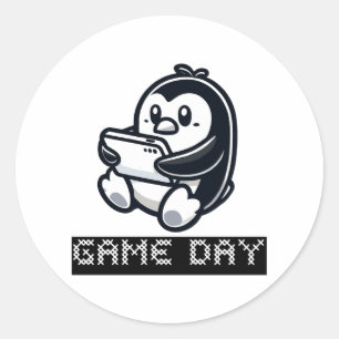 Sticker Rond Cute Penguin joue à un jeu vidéo - Jour du jeu