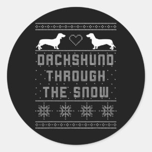 Sticker Rond Dachshund À Travers Le Chandail De Noël Laide Neig