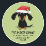 Sticker Rond Dachshund Père Noël Christmas Holiday Adresse de r<br><div class="desc">Stickers d’adresse de retour de vacances pour amoureux de Dachshund. Caricature de chien mignonne, en noir et blanc, portant un chapeau de Père Noël. Ajoutez cette touche personnelle pour rendre vos mailings de Noël plus spéciaux. Cette drôle de conception Doxie est disponible sur plus de produits, y compris les cartes...</div>
