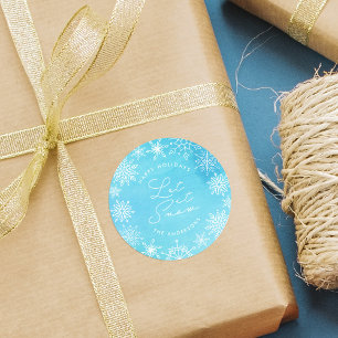 Sticker Rond Des flocons de neige bleus font la neige pendant l