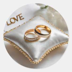 Sticker Rond Deux bagues mariages sur un coussin blanc