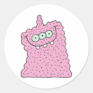 Sticker Rond drôle de monstre rose à trois yeux