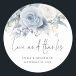 Sticker Rond Dusty Blue Florals Aimer Merci Mariage<br><div class="desc">Dusty Blue Florals Aime Merci Mariage. De belles fleurs bleu clair en été décorent le dessus,  et Love and Thanks est dans un ensemble informel écrit à la main. Personnalisez facilement vos noms et votre date de mariage.</div>