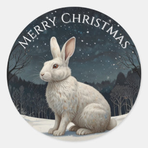 Sticker Rond Elégant lapin blanc Noël forêt enneigée