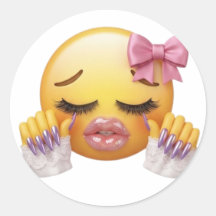 Émoji pleurant avec un nœud rose et des ongles